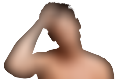 Shirtless man with smooth skin is running his fingers through his hair